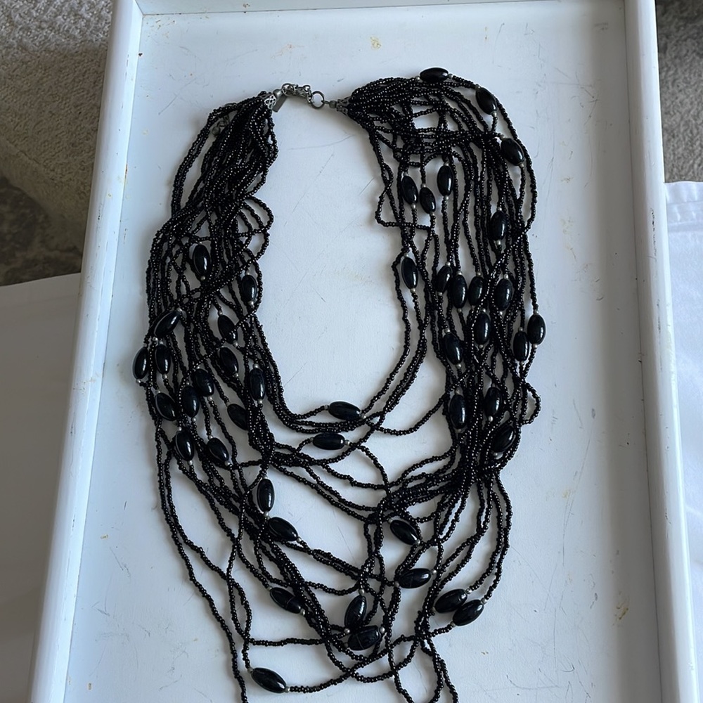 Multi stranded, beaded, fun, fashion, necklace. Makes a statement.
